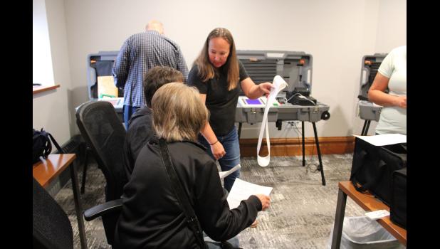 Jessica Fouts from MicroVote answers questions about the Voter Verified Paper Audit Trail (VVPAT) paper slip. 