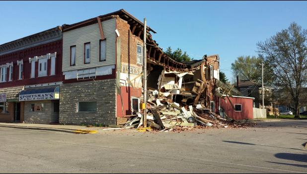 The rumble of a building collapsing took many by surprise on April 23, as a portion of the Sportsman’s Bar and Grill building caved in.