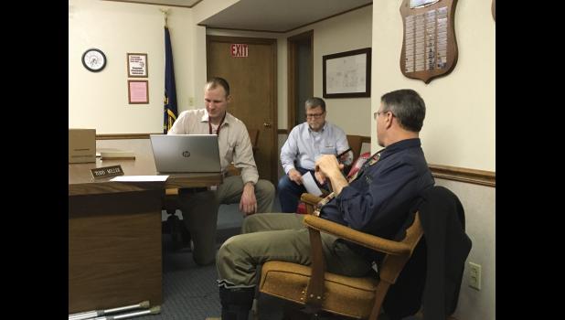 West Central School Superintendent Dan Zylstra worked on the corporation computers in hopes of using them for two school board members to attend a recent meeting electronically.