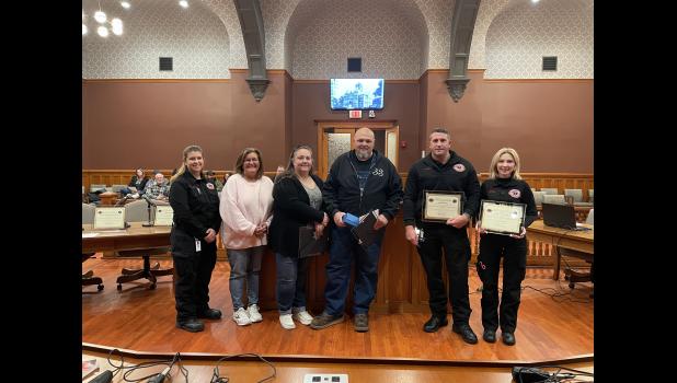 Photo by Megan Galbreath A Pulaski County Dispatcher and two EMTs were presented with awards on Nov. 10 for saving a man’s life who went into cardiac arrest this past July. Pictured from left to right: EMS Director Natasha Daugherty, 911 Director Angela VanArsdale, Dispatcher Megan Hollon, cardiac arrest survivor Kevin Bolton, Paramedic James Handy and EMT Kayla Clemons.
