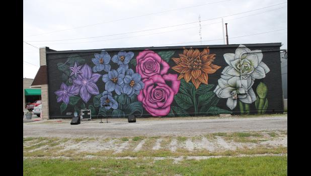 Francesville's first public art piece is featured on the side of the Neihouser Building in Francesville. The art piece was created by muralist Jenna Morello.