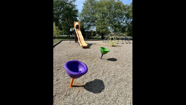 Photo provided. Remington Seeds purchased and volunteered to install new park equipment at the Francesville Town Park.