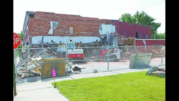 After a year of looking at an eyesore, Monterey residents are seeing the collapsed portion of the Sportsman’s Bar and Grill cleaned up.