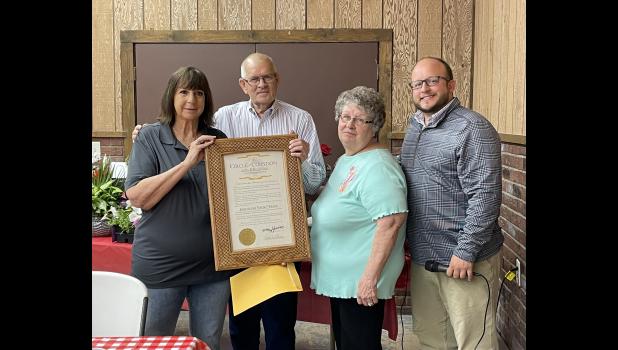 Photos by Megan Galbreath Director of Pulaski County Human Services Jacki Frain was presented with the Governor’s Circle of Corydon award Wednesday. Pictured left to right: Jacki Frain, Indiana Representative Doug Gutwein, Judy Heater and Jon Frain