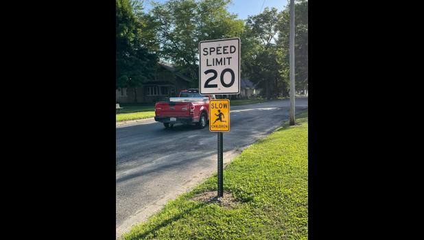 Photo by Megan Galbreath One of the two “slow, children” signs has been put up on Main Street to slow traffic down in town.