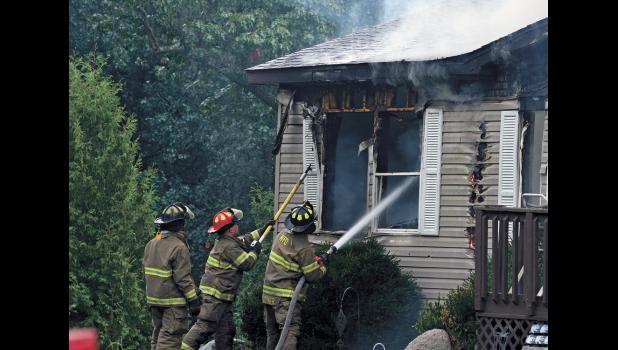 Firefighters from North Judson, Medaryville and Winamac were dispatched Monday, Aug. 13, to battle a house engulfed in fire.