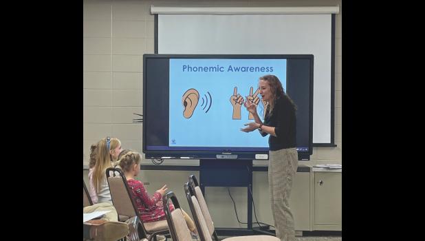 Photo by Megan Galbreath Teacher Mandy Bennett says the sounds, then the students put them together to make words.
