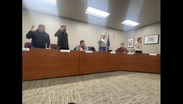 Photo by Megan Galbreath School board members Steve Rausch, Jimmy Terry, Greg Kiser and Taylor White are sworn-in on Jan. 13.