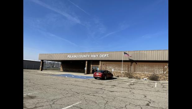 Photo by Megan Galbreath Pulaski County Highway Superintendent Gary Kruger told the commissioners that the roof at the highway garage leaked three gallons of water into the meeting room the morning of the meeting.