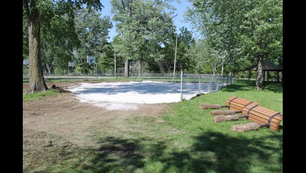 A base has been created for a new surface in the toddler playground area and all the equipment has been removed for new pieces.