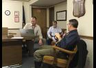 West Central School Superintendent Dan Zylstra worked on the corporation computers in hopes of using them for two school board members to attend a recent meeting electronically. 