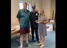 Clerk-Treasurer Linda McCune was recognized for her 25 years of service to the Monterey Town Council. Pictured are President Doug Denton, councilman Jim Fleury, Clerk-treasurer Linda McCune and councilwoman Emily Bailey (back).