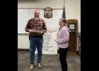 Board member Jeff Lowry congratulated Envee Echterling-Grandchamp for being the West Central Elementary School student of the month.