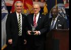State Rep. Doug Gutwein (R-Francesville) (center) received a “Service Before Self” Award from Indiana Military Veterans Legislative Day sponsors State Reps. Denny Zent (R-Angola) (left) and John Bartlett (D-Indianapolis) (right) honoring his military service and legislative efforts to help Hoosier veterans on Monday, Jan. 27, at the Statehouse in Indianapolis. A veteran of the Vietnam War, Gutwein worked on several pieces of legislation to help Hoosier veterans and active service members.