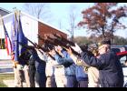 Photo by Paul Hettinger American Legion and VFW members fire a gun salute during the annual Veterans Day ceremony.
