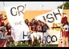 The Warriors come charging onto the football field capping off a week of homecoming celebrations. Photo by Paul Hettinger.