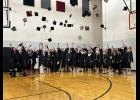 The West Central graduating class of 2024 celebrates their accomplishment with the throwing of the caps.