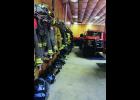 The Medaryville/White Post Volunteer Fire Department lacks space so much that the firefighters’ gear lines one long wall and is exposed to the exhaust of the vehicles.