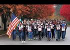 More than 300 Winamac Community High School students and faculty march in silence from the school to the courthouse carrying banners representing each veteran from Pulaski County that served in World War I.