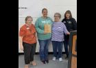 President Betty Stinemetz, Vice President Judy Heater and Executive Director Jacki Frain present the Alice White Community Service Award to Kim Burke (second from left).