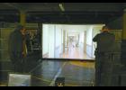 Pulaski County Sheriff’s Deputy Matt Pickens and reserve deputy and jail Sgt. Chris McAninch train with the scenario simulator on Nov. 1. This is the first time they have participated in the scenario with the sheriff’s office.