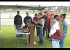The rain caused a chilly event, but Eagle Scout Shawn DePoy was supported well by community leaders and family. 