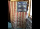Photo by Megan Galbreath An American flag dating back to the 1890s was found in the county clerk’s vault during the deconstruction of book storage shelving.