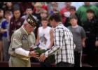 Tom Biniecki was presented a wreath to be placed on the new memorial in the high school gymnasium lobby honoring the Veterans of Pulaski County and Veterans everywhere as a constant reminder of those who gave the ultimate sacrifice.