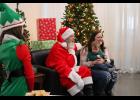 Santa Claus was happy to take some photos with families.