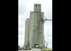 Monticello and Francesville firefighters climbed to the roof of the silos to soak a fire that was smoldering in the corn.