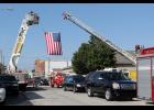 Sirens of fire trucks and emergency response vehicles could be heard before the funeral procession of Glenn Tiede Monday afternoon as it passed through Francesville. In his honor several area fire departments followed the procession and also secured the intersections as the cars traveled through.