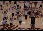 A choreographed routine featuring the Warrior cheerleaders and the Lil’ Cheer participants. 