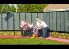 Ladies of the American Legion Auxiliary placed wreaths at the Vietnam Traveling Memorial Wall that was assembled in Francesville during the fall festival last weekend, in remembrance and honor of those who served. 