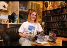 Lauren Zehner Ray with her award winning documentary film that is now available on DVD "Welcome to Monterey." Photo by Megan Galbreath.