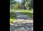 Photo by Megan Galbreath The Winamac parks board is looking into repaving the walking trail in the town park.