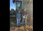 Photo provided. Jersey Stevens, Winamac Community High School sophomore, delivers a snack bag to local farmer, Alan Kestle.