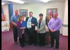 Wander Our Winamac members Ryan Harrison, Winamac Clerk-treasurer Melanie Berger, Theresa Calloway, Pulaski County Community Development Commission Executive Director Nathan Origer and town manager Brad Zellers were recently congratulated as their hard work came to fruition and the downtown area was recognized as being a Main Street area. The organization was honored with a certificate by Office of Community and Rural Affairs Indiana Executive Director Bill Konyha.