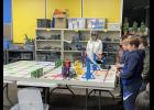 Photo by Megan Galbreath The Eastern Pulaski VEX Robotics team gave a robotics demonstration during a regular school board meeting on Dec. 12.