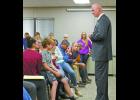 Eastern Pulaski Community School Corporation Board members approved to cancel the coaching contract of boys varsity basketball coach Kyle Johnson. Johnson thanked those who were in the audience for their support. 