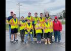 Photo provided. The scouts recently enjoyed a complimentary drink from Good Oil after picking up trash along Hwy 35.